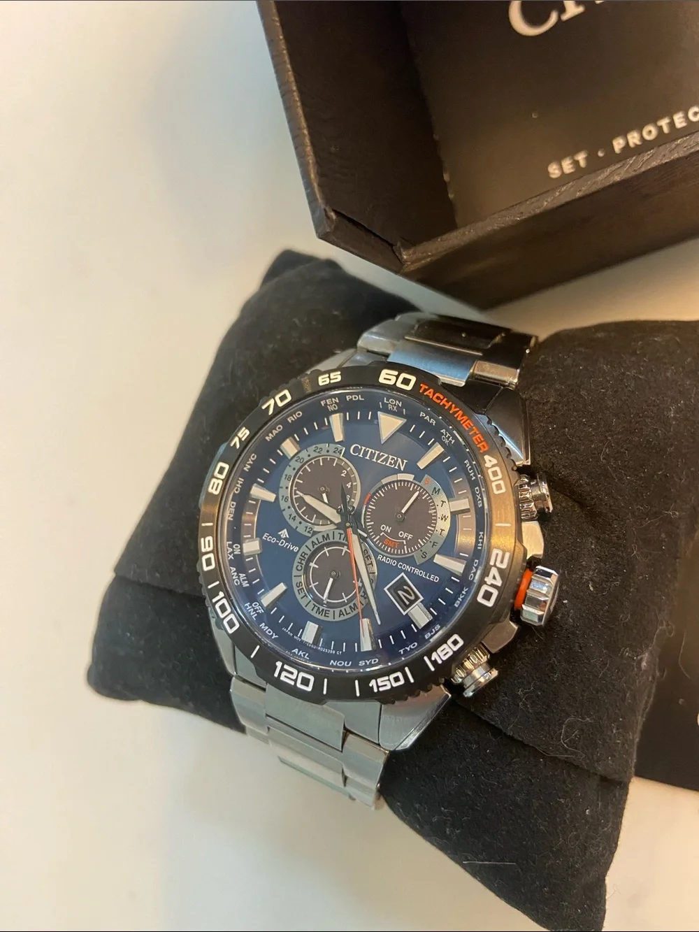 Citizen Eco-Drive Stainless Watch with Blue Dial and Silver Bracelet.. sapphire